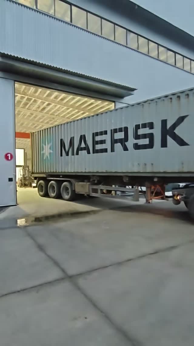 Container trailer outside the workshop in supplied footage